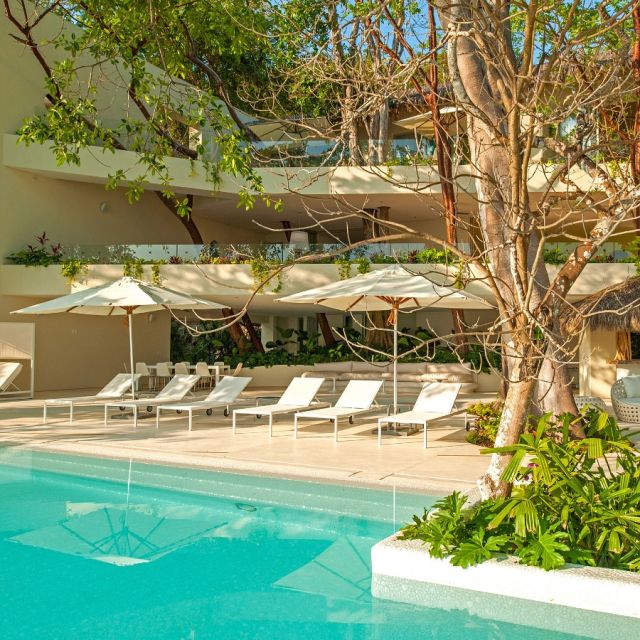 Ready for a holiday escape? Casa Papelillos is calling! This villa in #PuertoVallarta sits right in the exclusive El Paredon Residences on Banderas Bay, which means you get access to all the community’s top-notch amenities. 🏖️ 

With its cool blend of natural materials and glass, the place feels like it’s part of the landscape—there are even trees growing through the villa! It’s luxury meets nature in the best way. #VillasbyJourneyMexico

#mexico #mexicotravel #luxurytravel #travel #holidays #travelagent